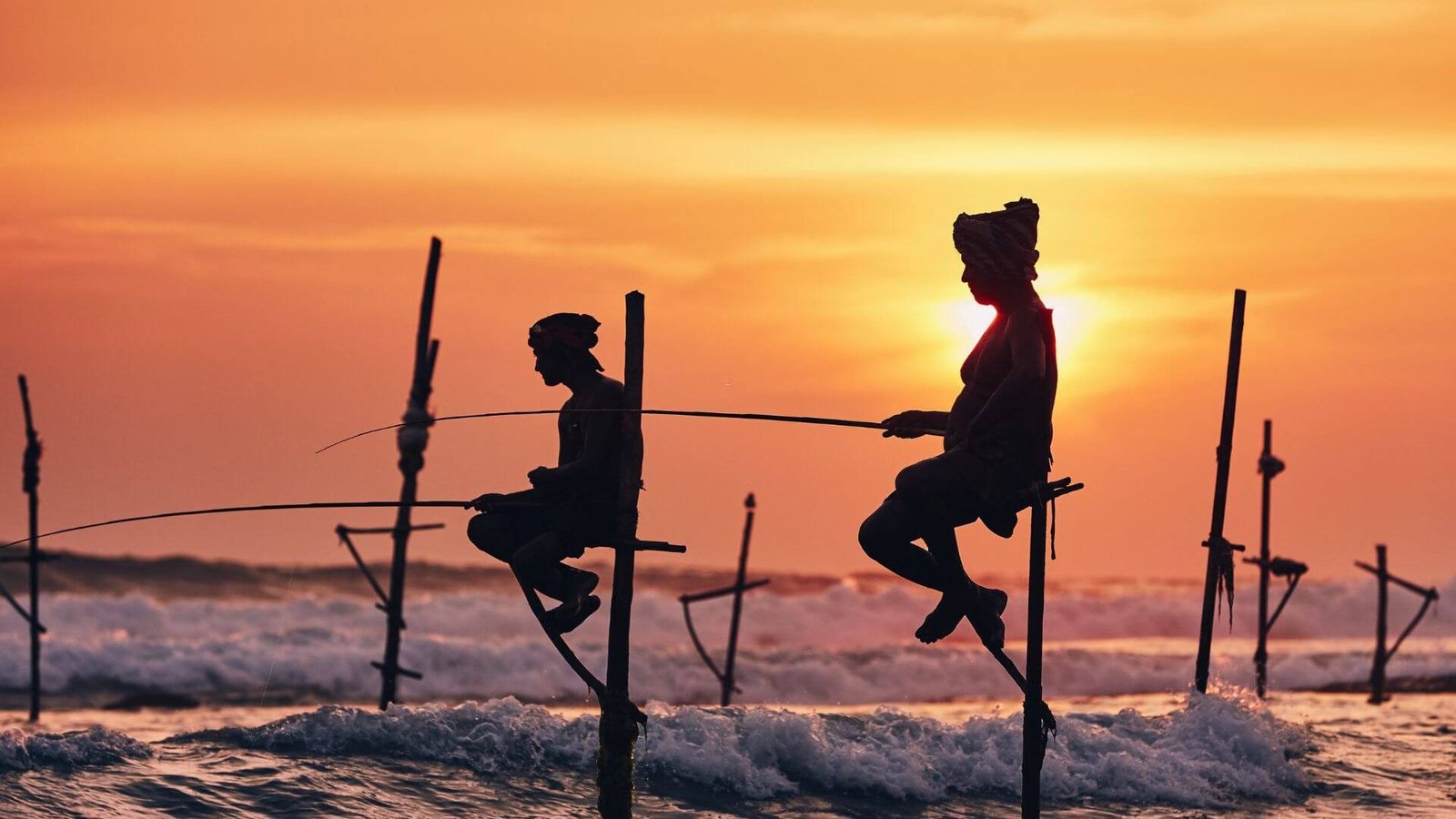 stilt-fishing-sri-lanka-sunset-ocean
